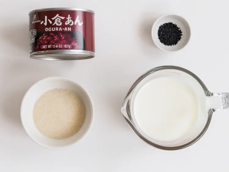 Ingredients for red bean ice cream including ogura-an, milk, sugar, and black sesame seeds