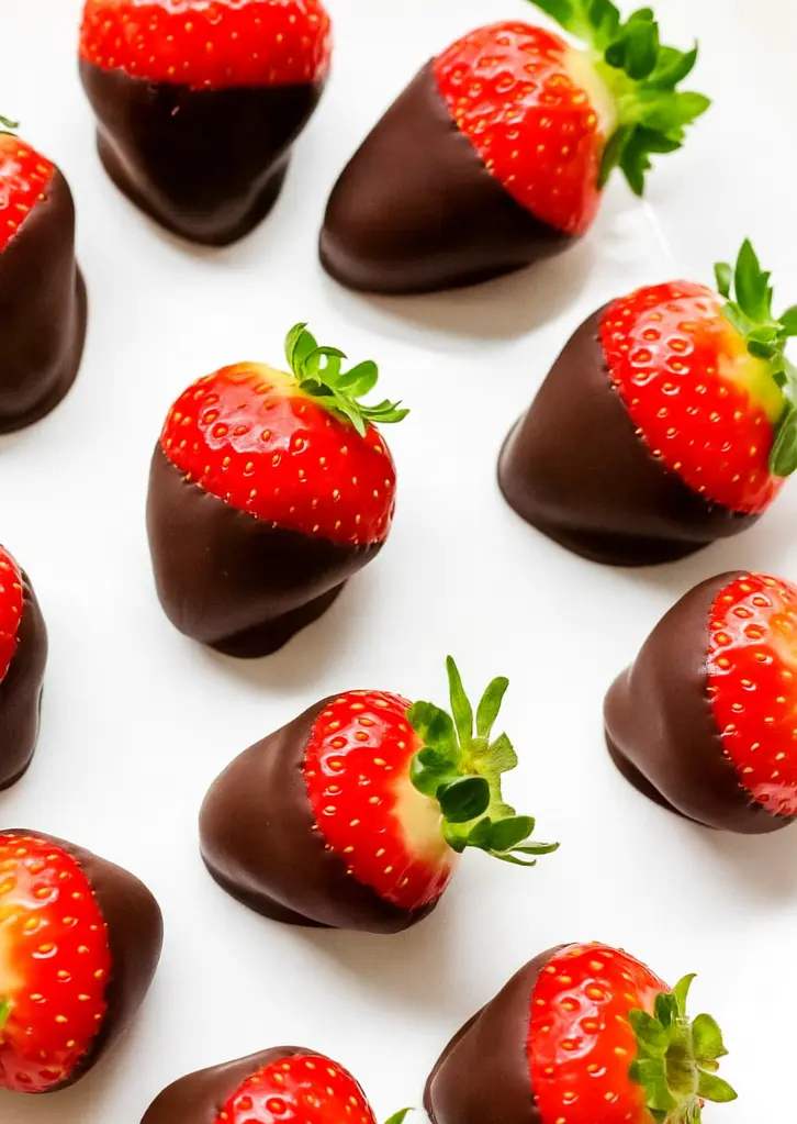 white plate with chocolate covered strawberries
