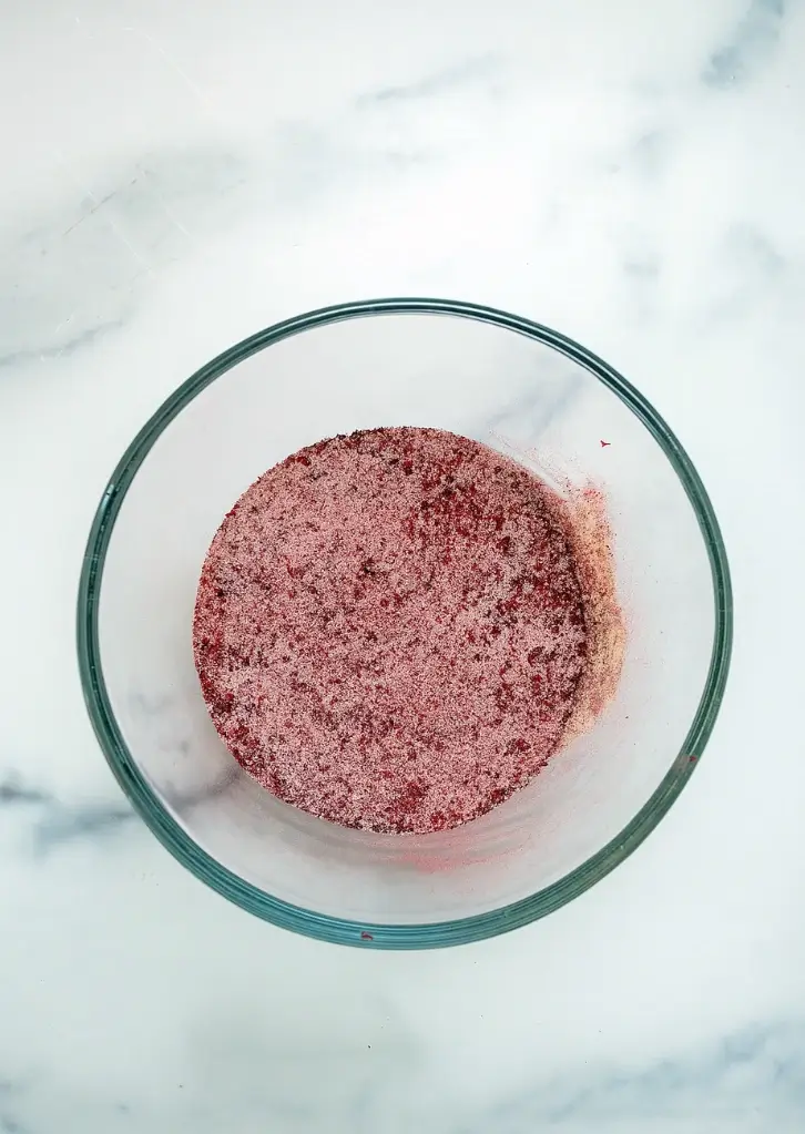 bowl of cherry powder blend on white background