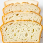 Sliced keto cottage cheese bread showing airy crumb texture
