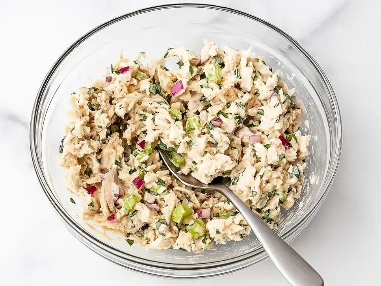 mixed cucumber tuna salad in bowl