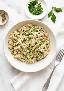 cucumber tuna salad in a white bowl