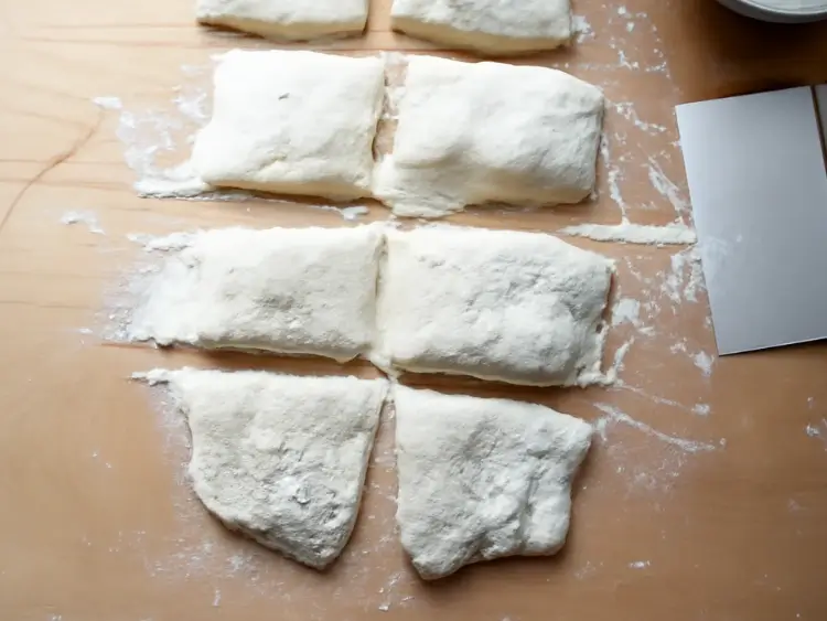 Sliced ciabatta rolls showing open crumb and airy texture